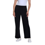 A model wearing black wide-leg cropped pants with a white top and white sneakers, shown from the waist down against a plain white background.