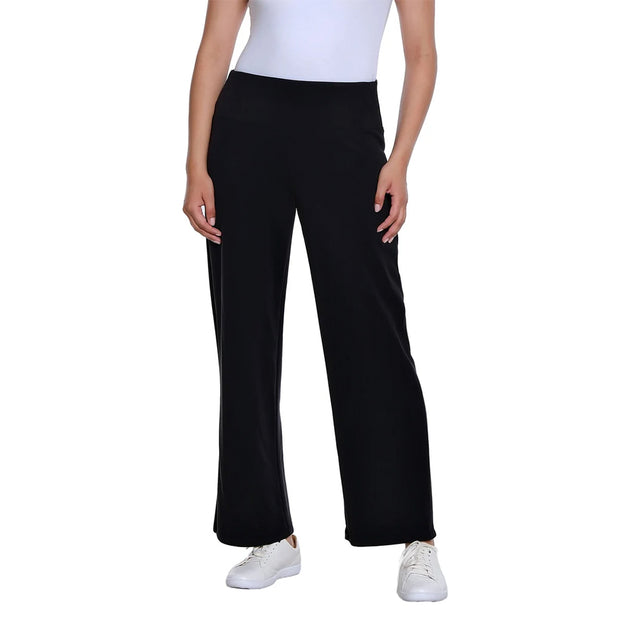 A model wearing black wide-leg cropped pants with a white top and white sneakers, shown from the waist down against a plain white background.