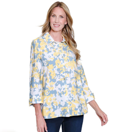 Woman wearing a floral blouse with a white background