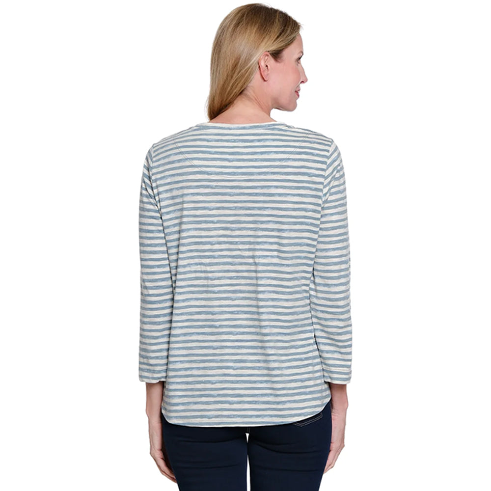 Woman wearing a striped long-sleeve shirt on a white background