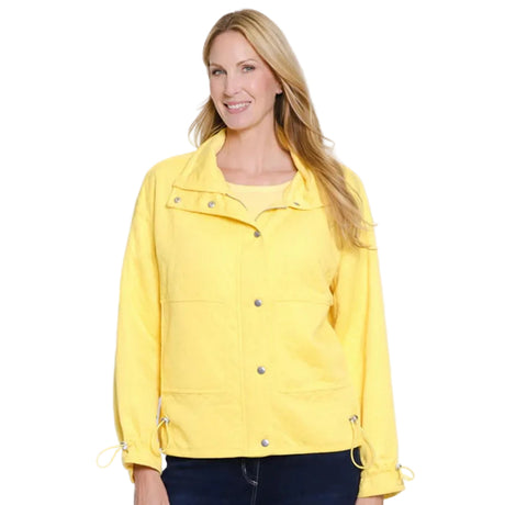 Woman wearing a yellow jacket on a white background