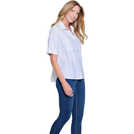 Woman wearing a striped shirt and blue jeans on a white background