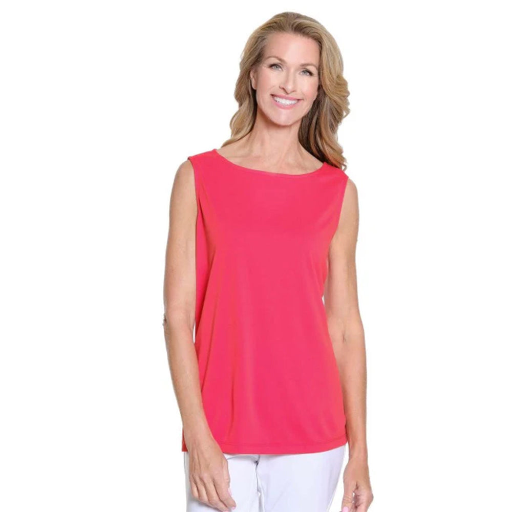 Woman wearing a bright pink sleeveless top on a white background