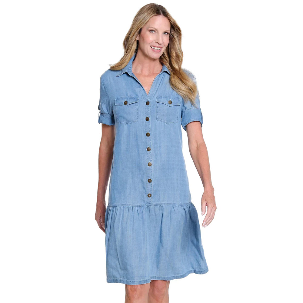 Woman wearing a blue denim dress on a white background