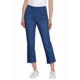 Person wearing blue jeans on a white background