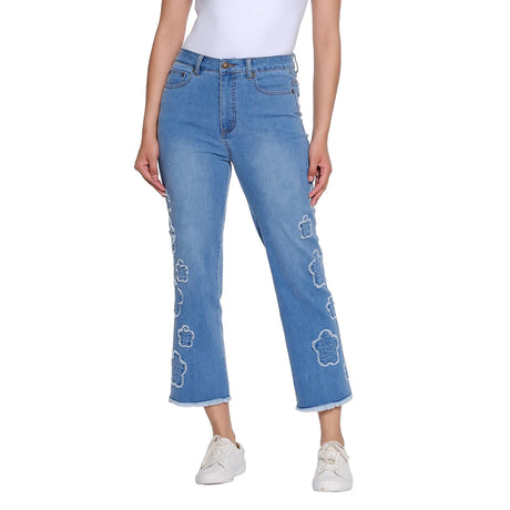 Blue jeans with floral embroidery on a white background