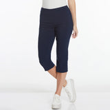 Navy blue capri pants worn by a person on a white background