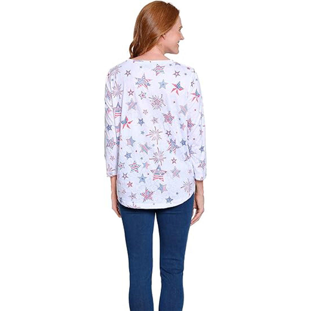 Woman wearing a white long-sleeve shirt with star pattern on a white background