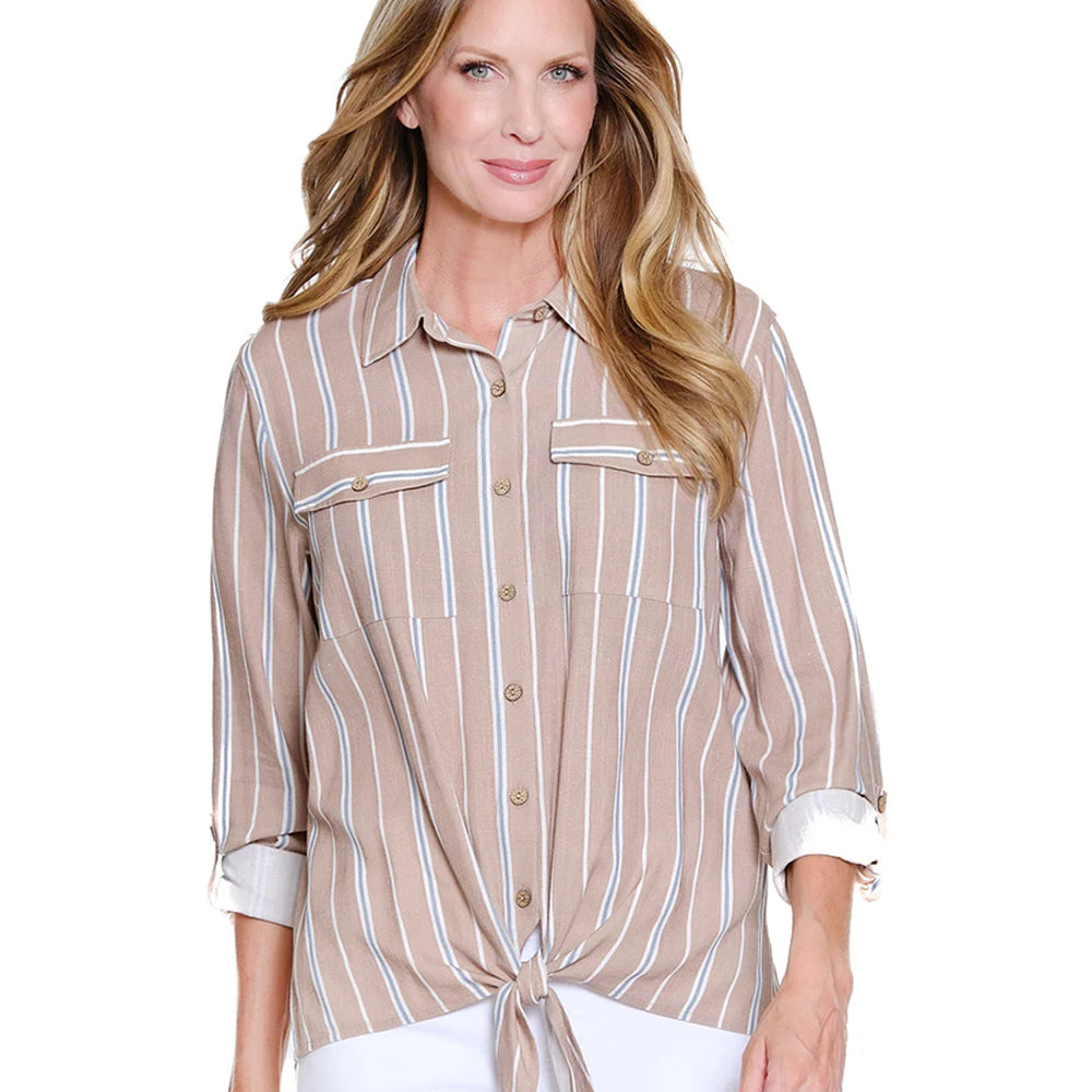 Woman wearing a beige and white striped shirt on a white background