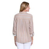 Woman wearing a beige and white striped shirt on a white background