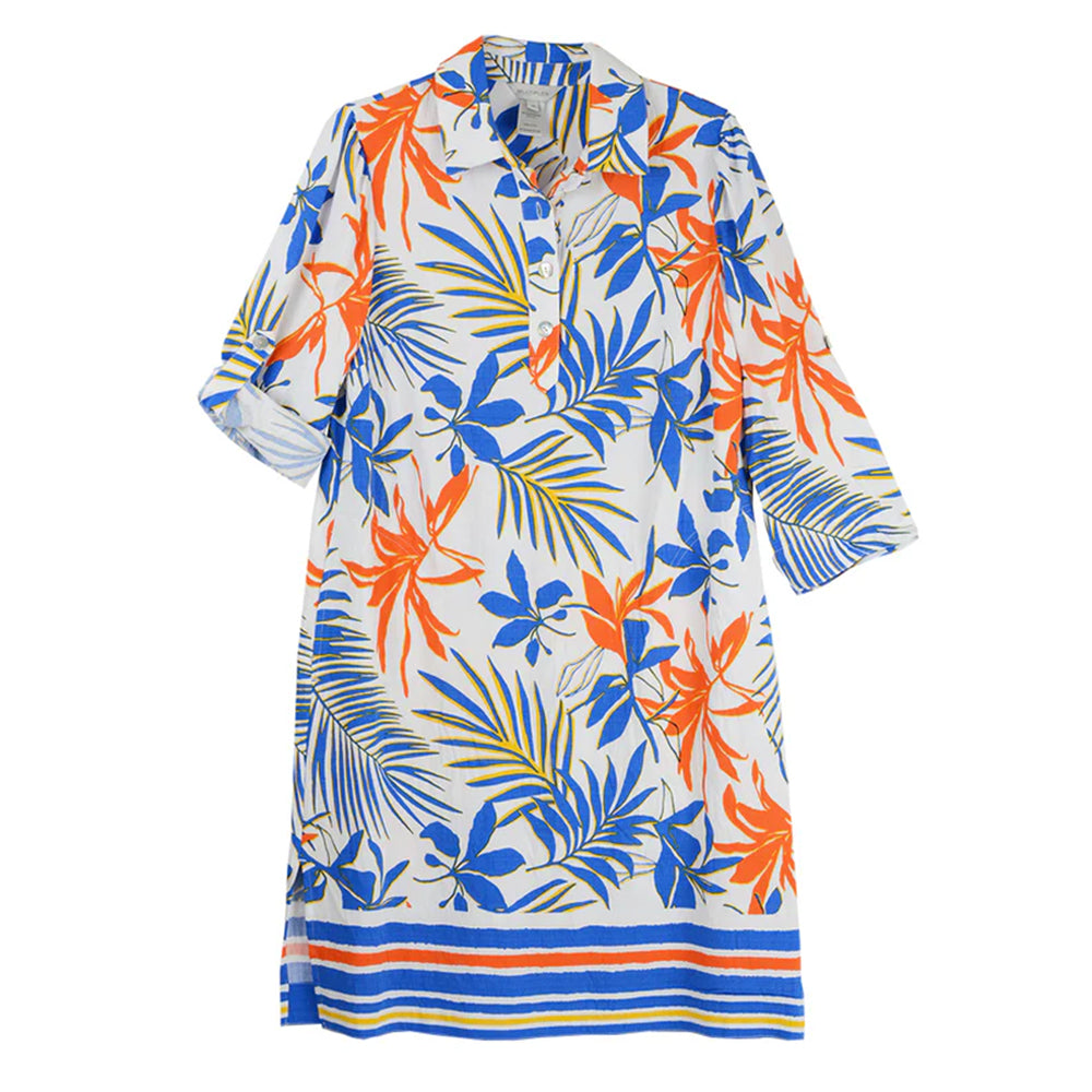 Colorful tropical leaf patterned dress on a white background