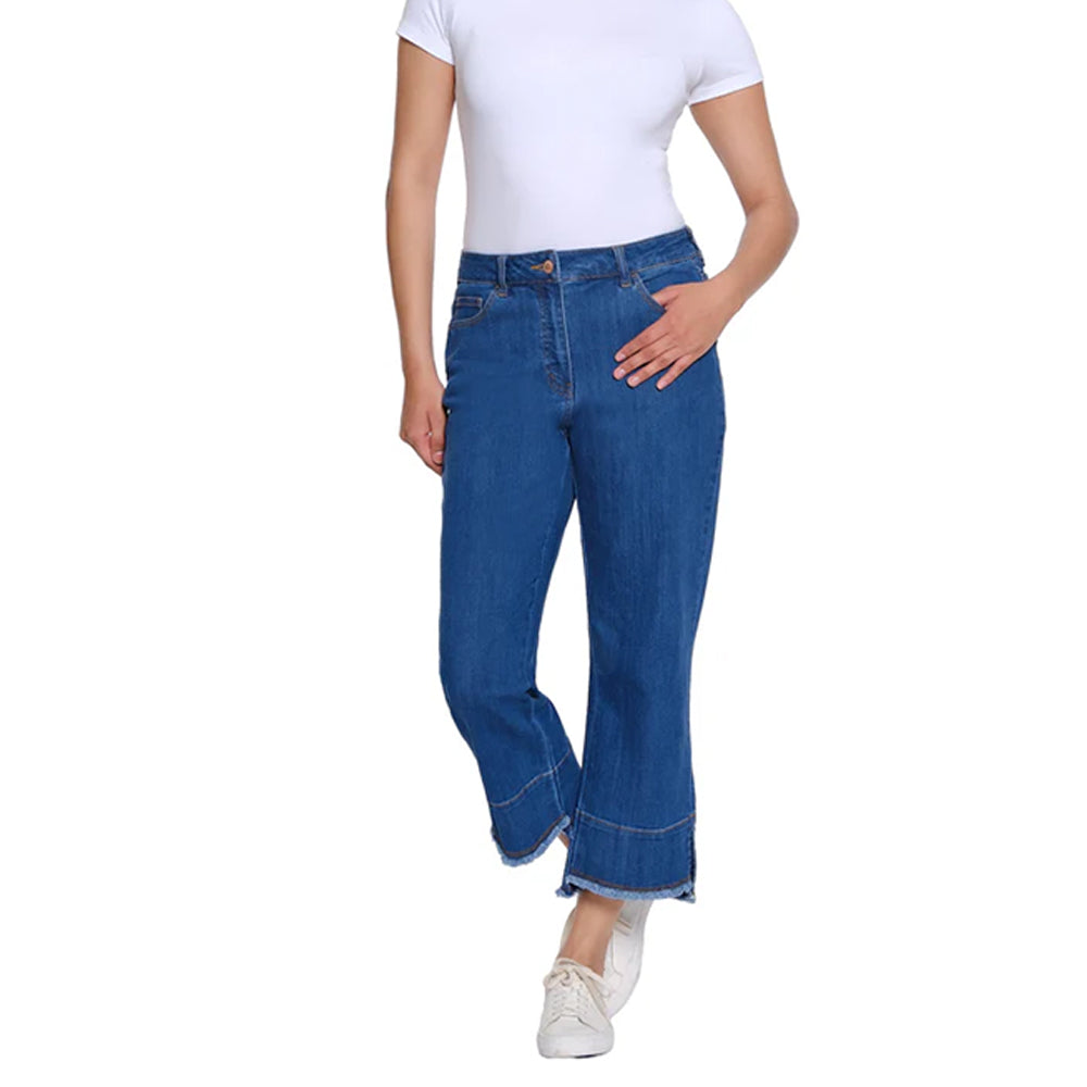 Person wearing blue jeans and a white shirt on a white background
