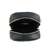 Black leather pouch with gold zipper on a white background