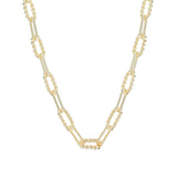 Gold chain necklace on a white background