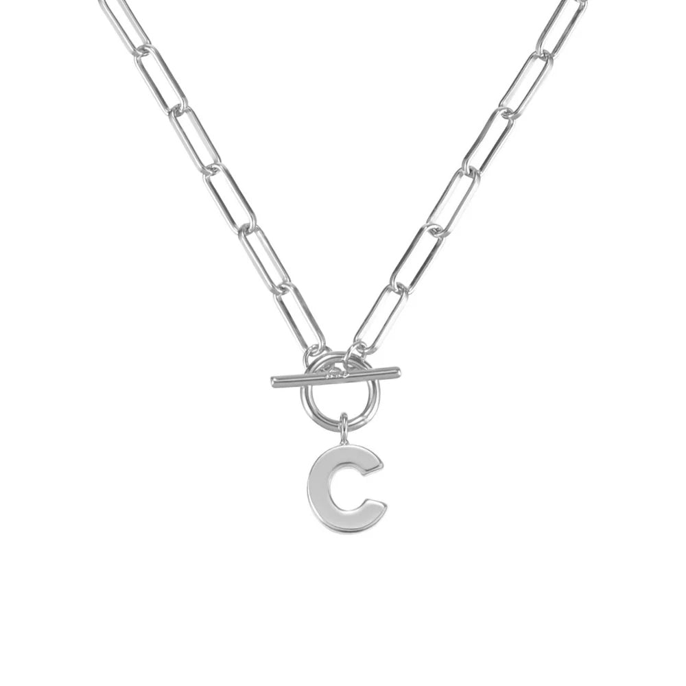 Silver necklace with a toggle clasp and 'C' pendant on a white background