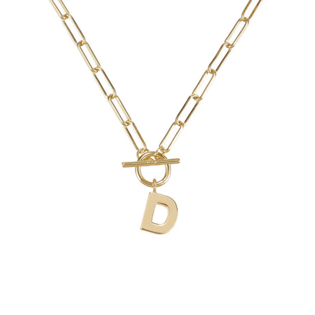 Gold necklace with a 'D' pendant on a white background