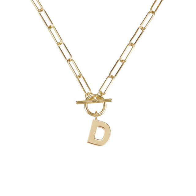 Gold necklace with a 'D' pendant on a white background