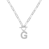 Silver necklace with a letter 'G' pendant on a white background