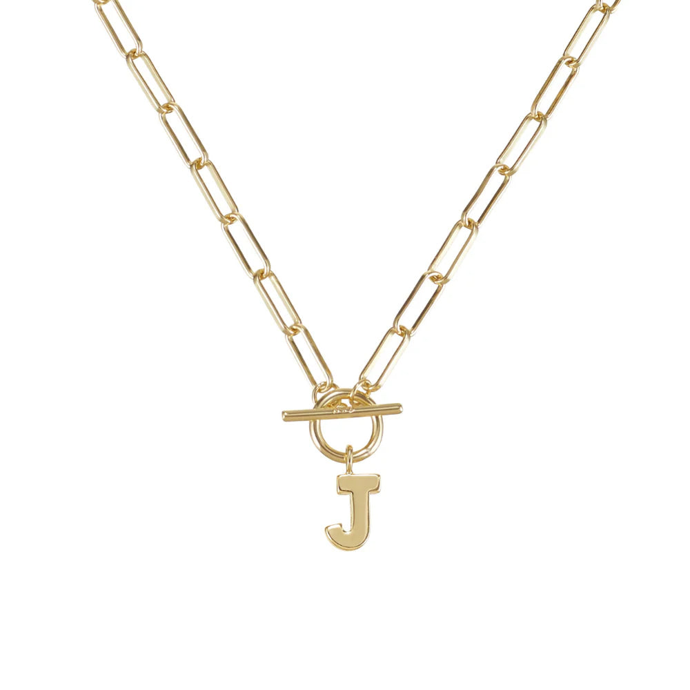 Gold necklace with a 'J' pendant on a white background