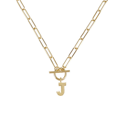 Gold necklace with a 'J' pendant on a white background
