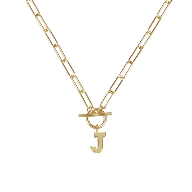 Gold necklace with a 'J' pendant on a white background