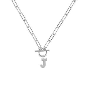 Silver necklace with a letter 'J' pendant on a white background