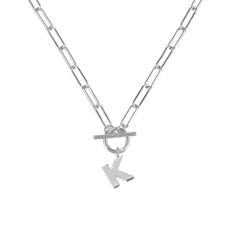 Silver necklace with a 'K' pendant on a white background