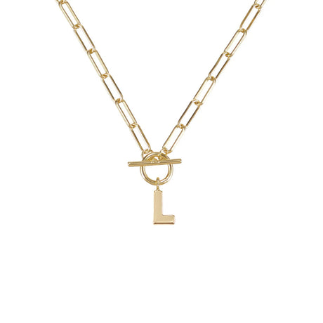 Gold necklace with a toggle clasp and 'L' pendant on a white background