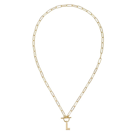 Gold chain necklace with a key pendant on a white background