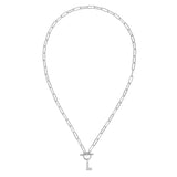 Silver chain necklace with a key pendant on a white background