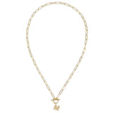 Gold necklace with a 'M' pendant on a white background