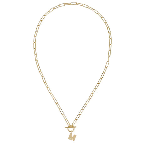 Gold necklace with a 'M' pendant on a white background