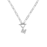 Silver necklace with a toggle clasp and 'M' pendant on a white background