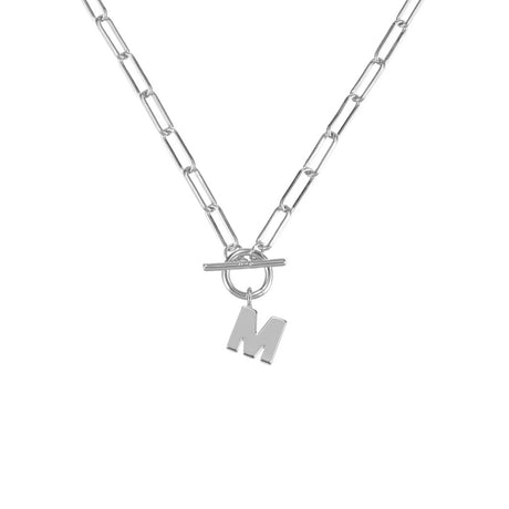 Silver necklace with a toggle clasp and 'M' pendant on a white background