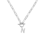 Silver necklace with a toggle clasp and 'N' pendant on a white background