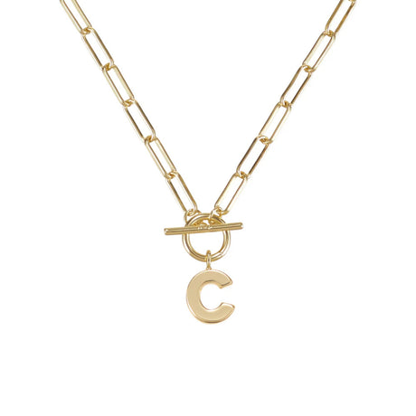 Gold necklace with a letter 'C' pendant on a white background