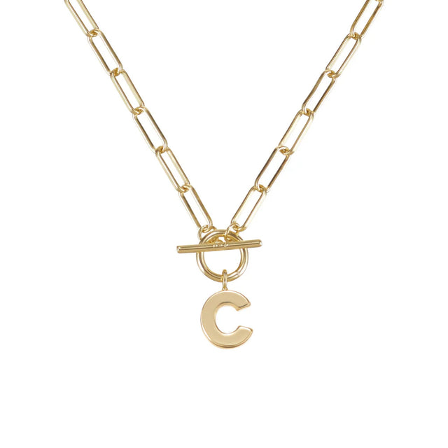Gold necklace with a letter 'C' pendant on a white background