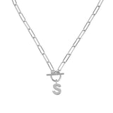 Silver necklace with a letter 'S' pendant on a white background