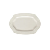 White ceramic platter with wavy edge on a white background