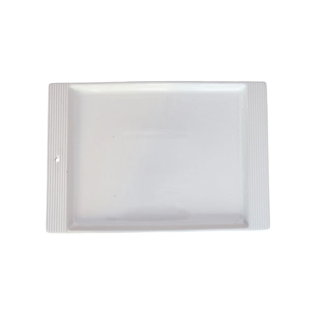 Rectangular white plastic sheet on a white background