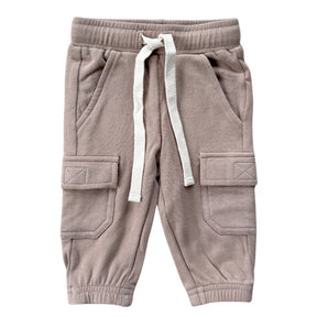 Brown cargo jogger pants with white drawstring on a white background