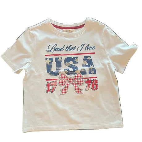 White t-shirt with 'Land that I love USA 1776' text on a white surface