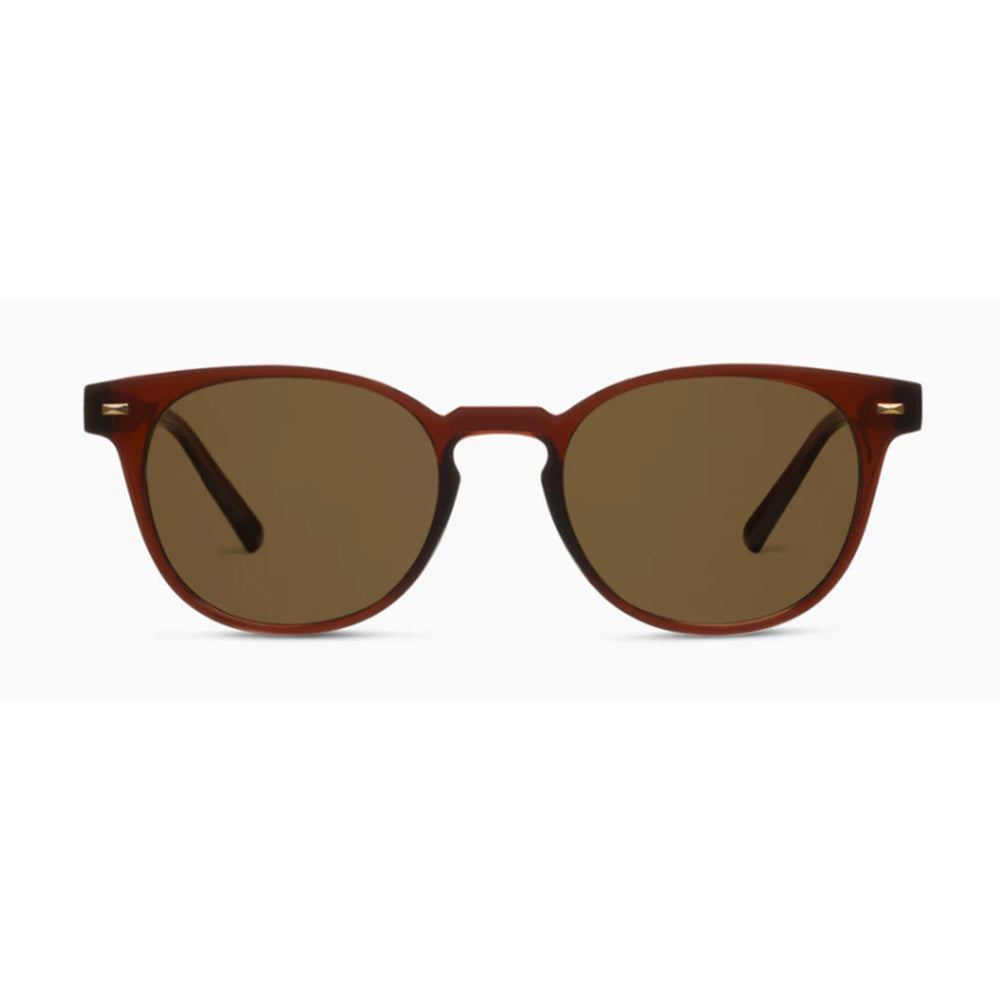Sunglasses with brown lenses and red frame on a white background