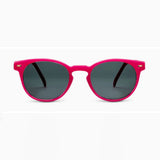 Pink sunglasses with dark lenses on a white background