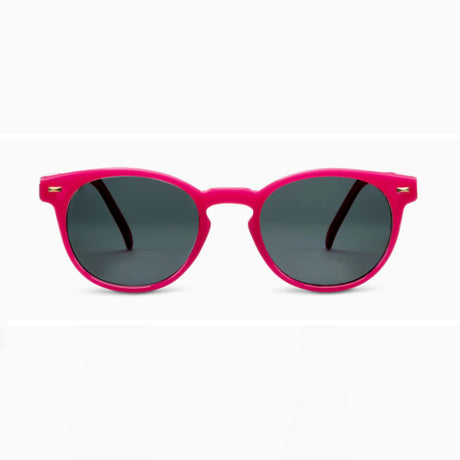 Pink sunglasses with dark lenses on a white background