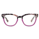 A pair of Peepers Faye reading glasses with a black marble pattern and pink accents on the arms.