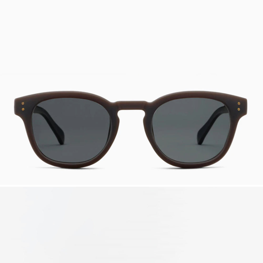 Sunglasses with dark brown frame and gray lenses on a white background