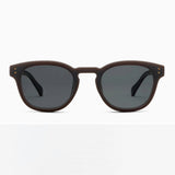 Sunglasses with dark brown frame and gray lenses on a white background