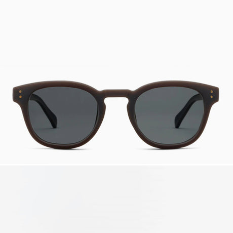 Sunglasses with dark brown frame and gray lenses on a white background