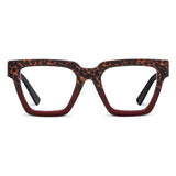 A pair of Peepers Take A Bow Leopard Tortoise Red reading glasses with a square-shaped frame and red accents.